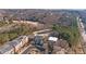 Aerial view of townhomes nestled near a golf course at 3156 Neal Ct, Cumming, GA 30041