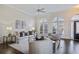 Living room with hardwood floors, neutral decor, and arched windows at 3156 Neal Ct, Cumming, GA 30041