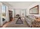 Sunlit living room with hardwood floors and large windows at 5659 Brookstone Nw Dr, Acworth, GA 30101