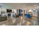 Open concept kitchen with white and blue cabinetry, island, and hardwood floors at 2439 Woodridge Dr, Decatur, GA 30033