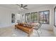 Bright sunroom with dining area, herringbone tile floor, and large windows at 2439 Woodridge Dr, Decatur, GA 30033