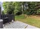 Private backyard patio with grill, surrounded by lush greenery at 2680 Pine Tree Ne Rd # 2, Atlanta, GA 30324