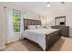 Main bedroom with king-size bed and en-suite bathroom at 2680 Pine Tree Ne Rd # 2, Atlanta, GA 30324