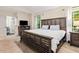 Main bedroom with king bed, en-suite bath access, and ample natural light at 2680 Pine Tree Ne Rd # 2, Atlanta, GA 30324