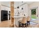 Kitchen boasts a breakfast bar with seating, white cabinets and wood accents at 2680 Pine Tree Ne Rd # 2, Atlanta, GA 30324