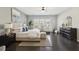 Relaxing main bedroom with a king-size bed and dark hardwood floors at 6442 Canopy Dr, Sandy Springs, GA 30328