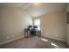 Bright bedroom with carpeted floors and a workspace at 2777 Lakeview Walk, Decatur, GA 30035