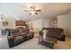 Open concept living room with kitchen and dining area at 2777 Lakeview Walk, Decatur, GA 30035