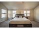 Main bedroom with high ceilings, king bed, and ample natural light at 2777 Lakeview Walk, Decatur, GA 30035