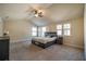 Large main bedroom with high ceilings, king-size bed, and plenty of natural light at 2777 Lakeview Walk, Decatur, GA 30035