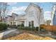 Two-story house with light gray siding, front porch, and landscaping at 3216 Colchester St, Douglasville, GA 30135