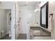 Modern bathroom with a walk-in shower and gray vanity at 364 Concord St, Alpharetta, GA 30009