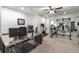 Home gym and office combo with various equipment at 364 Concord St, Alpharetta, GA 30009