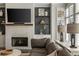 Living room featuring a white brick fireplace and comfortable seating at 364 Concord St, Alpharetta, GA 30009