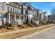 Row of townhouses featuring brick exteriors and front porches at 364 Concord St, Alpharetta, GA 30009