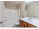 Clean bathroom with shower/tub combo and wood vanity at 3879 Brockenhurst Dr, Buford, GA 30519