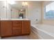 Bathroom boasts double sinks and garden tub at 3879 Brockenhurst Dr, Buford, GA 30519