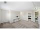 Large bonus room with neutral carpet and a view of the bedroom and laundry room at 522 Spring View Dr, Woodstock, GA 30188