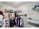 Organized walk-in closet featuring shelving and storage, designed to maximize space and convenience at 522 Spring View Dr, Woodstock, GA 30188