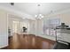 Bright dining room with hardwood floors and access to office at 522 Spring View Dr, Woodstock, GA 30188