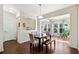 Bright dining room with hardwood floors and access to sunroom at 522 Spring View Dr, Woodstock, GA 30188