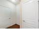 Hallway with two white doors at 522 Spring View Dr, Woodstock, GA 30188
