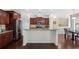 Kitchen featuring an island, stainless steel appliances, and hardwood floors at 522 Spring View Dr, Woodstock, GA 30188