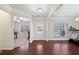 Spacious living area featuring hardwood floors and ample natural light at 522 Spring View Dr, Woodstock, GA 30188
