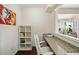 Comfortable home office nook featuring a built-in desk with granite counters at 522 Spring View Dr, Woodstock, GA 30188