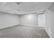 Unfinished basement with neutral-colored walls and concrete flooring at 2234 Cherokee Valley Dr, Lithonia, GA 30058