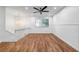 Bright living room featuring hardwood floors and a ceiling fan at 2234 Cherokee Valley Dr, Lithonia, GA 30058