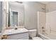 Clean bathroom with white vanity, bathtub, and shower at 1016 Madeline Ct, Loganville, GA 30052