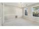 Dining room with neutral walls, carpet flooring, and a chandelier at 1016 Madeline Ct, Loganville, GA 30052