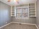 Bedroom with built-in shelving and window at 2196 Knoll Dr, Decatur, GA 30032