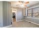 Bedroom with grey walls, carpet, and built in shelves at 2196 Knoll Dr, Decatur, GA 30032