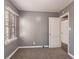 Cozy bedroom with gray walls, carpet flooring, and a window at 2196 Knoll Dr, Decatur, GA 30032