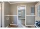 View of kitchen area with wood-look flooring and painted gray walls at 2196 Knoll Dr, Decatur, GA 30032