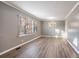 Bright living room featuring hardwood floors and grey walls at 2196 Knoll Dr, Decatur, GA 30032