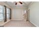 Bright bedroom with carpet flooring, neutral walls, and ample natural light at 2790 Laurel Valley Trail, Buford, GA 30519