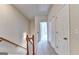 Upstairs hallway with doors to bedrooms at 2790 Laurel Valley Trail, Buford, GA 30519