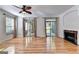 Spacious living room with hardwood floors, fireplace and access to balcony at 2790 Laurel Valley Trail, Buford, GA 30519