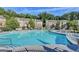 Community pool with ample deck space and lounge chairs at 2790 Laurel Valley Trail, Buford, GA 30519