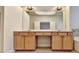 Double vanity bathroom with light wood cabinets at 2790 Laurel Valley Trl, Buford, GA 30519