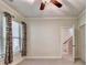 Bright bedroom with large windows and neutral walls at 2790 Laurel Valley Trl, Buford, GA 30519