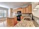 Eat-in kitchen featuring granite countertops and stainless steel appliances at 2790 Laurel Valley Trl, Buford, GA 30519