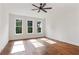 Spacious bedroom with hardwood floors and ceiling fan at 600 Autumn Ln, Marietta, GA 30068