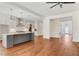 Open concept living room and kitchen area with hardwood floors at 600 Autumn Ln, Marietta, GA 30068