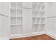 Bright walk-in closet with custom shelving at 600 Autumn Ln, Marietta, GA 30068