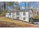 Ranch home with attached garage and wooded lot at 607 Ann Ct, Woodstock, GA 30188