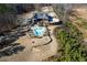 Aerial view of home, pool, and expansive lot at 1150 Brushy Mountain Rd, Rockmart, GA 30153